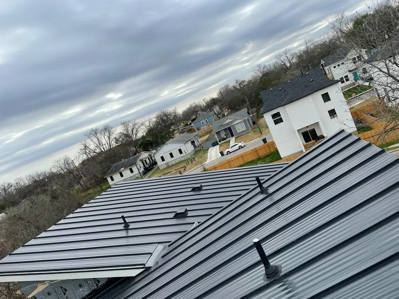 Standing seam metal roof panels with vents for Skylight Repair in St. John